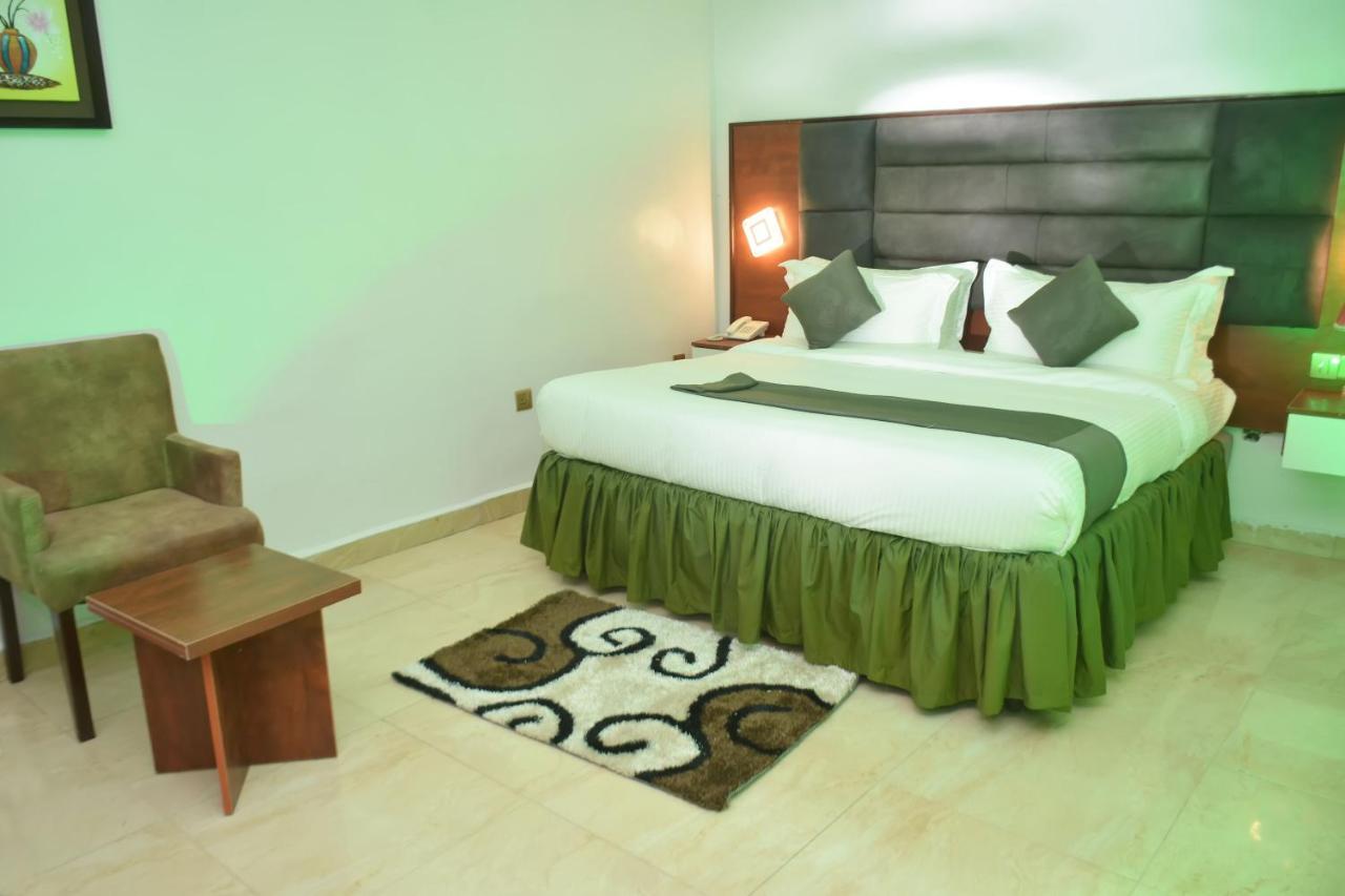 Vacation Villa Hotels And Suites Асаба Екстер'єр фото