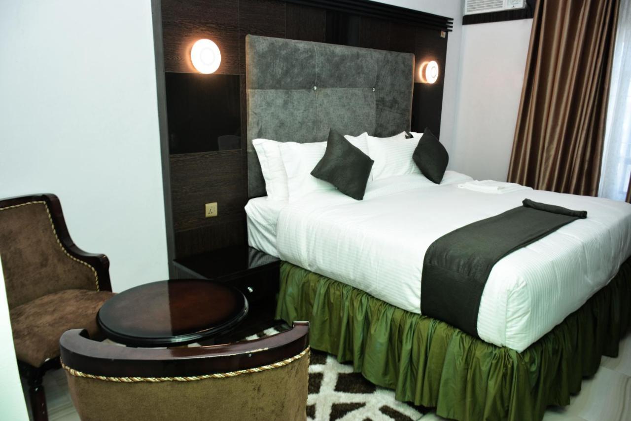 Vacation Villa Hotels And Suites Асаба Екстер'єр фото